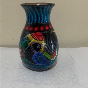 handcrafted Mexican folk art terracotta clay vase